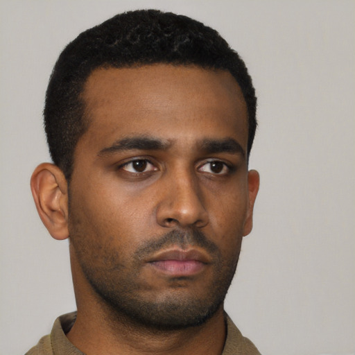 Neutral black young-adult male with short  brown hair and brown eyes