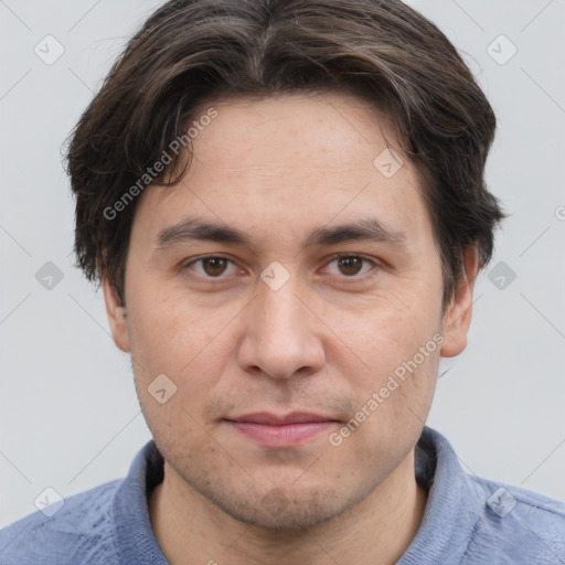 Joyful white adult male with short  brown hair and brown eyes