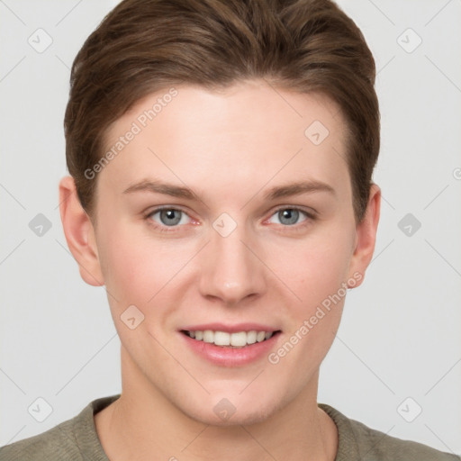 Joyful white young-adult female with short  brown hair and grey eyes