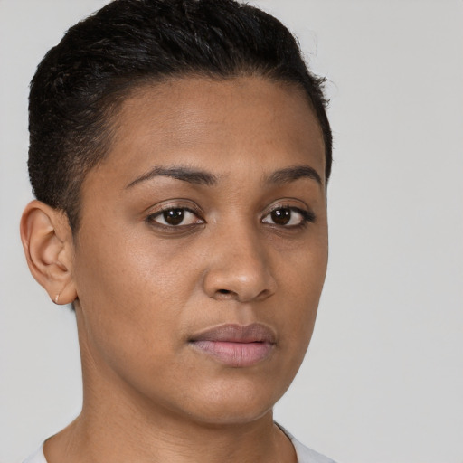 Neutral latino young-adult female with short  brown hair and brown eyes