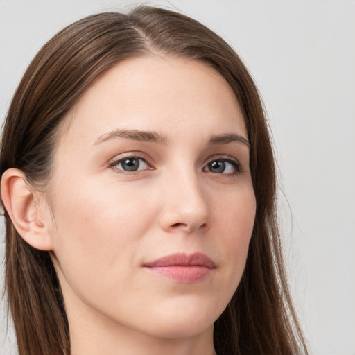 Neutral white young-adult female with long  brown hair and grey eyes