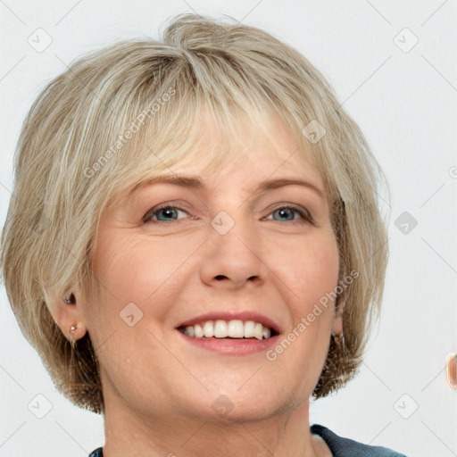 Joyful white adult female with medium  brown hair and blue eyes