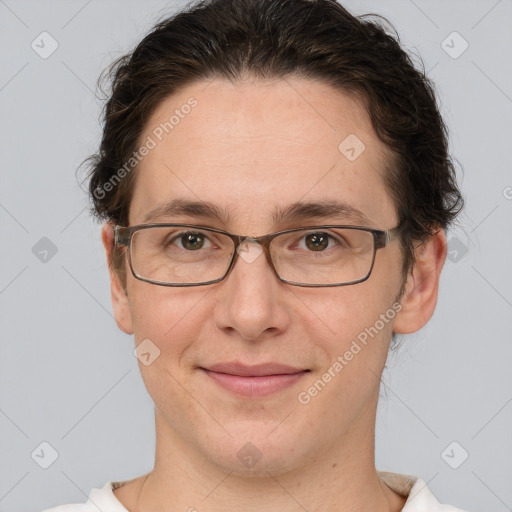 Joyful white adult female with short  brown hair and brown eyes