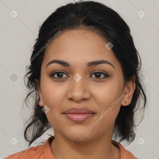 Joyful latino young-adult female with medium  brown hair and brown eyes