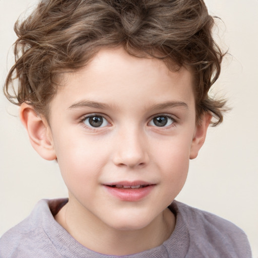 Joyful white child male with short  brown hair and grey eyes