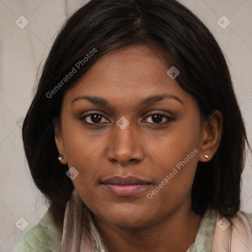 Neutral black young-adult female with long  brown hair and brown eyes