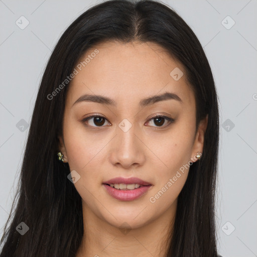 Joyful asian young-adult female with long  brown hair and brown eyes