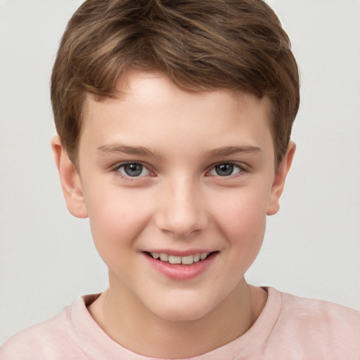 Joyful white child male with short  brown hair and brown eyes