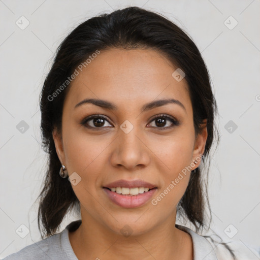 Joyful latino young-adult female with medium  brown hair and brown eyes