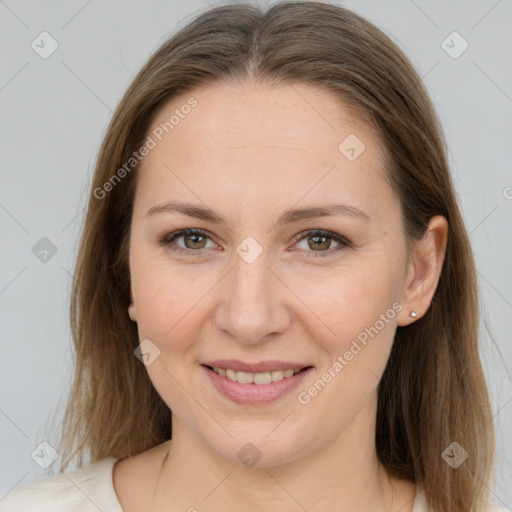 Joyful white young-adult female with long  brown hair and brown eyes