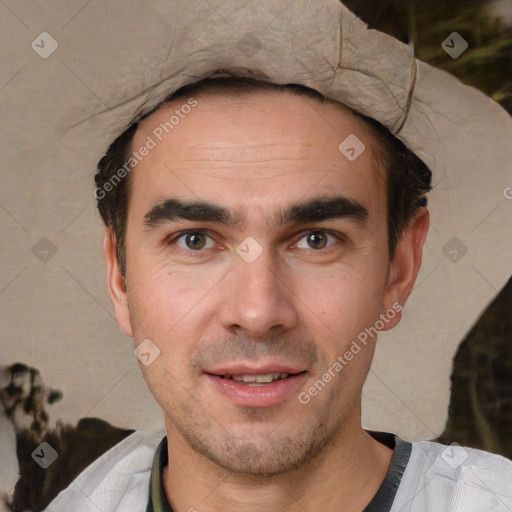 Joyful white young-adult male with short  black hair and brown eyes