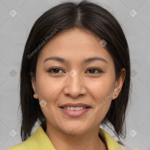 Joyful asian young-adult female with medium  brown hair and brown eyes