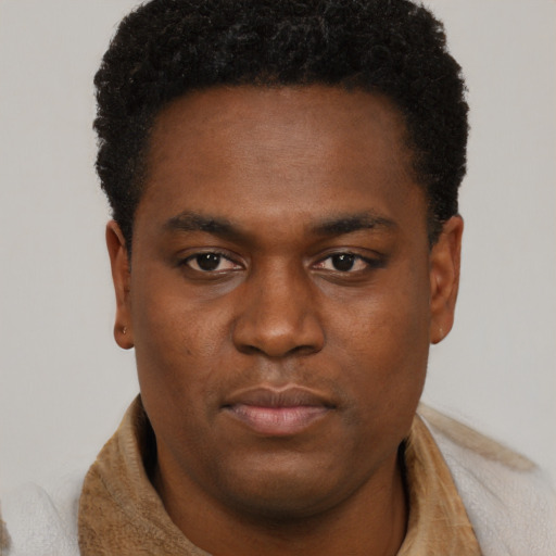 Neutral black young-adult male with short  brown hair and brown eyes