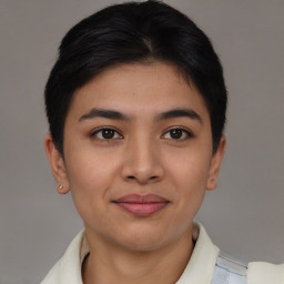 Joyful asian young-adult female with short  brown hair and brown eyes