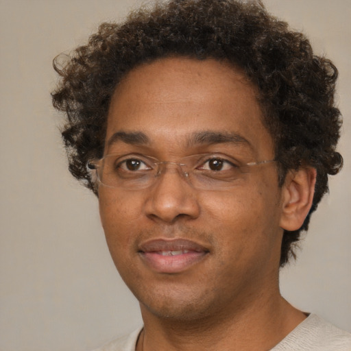 Neutral black adult male with short  brown hair and brown eyes