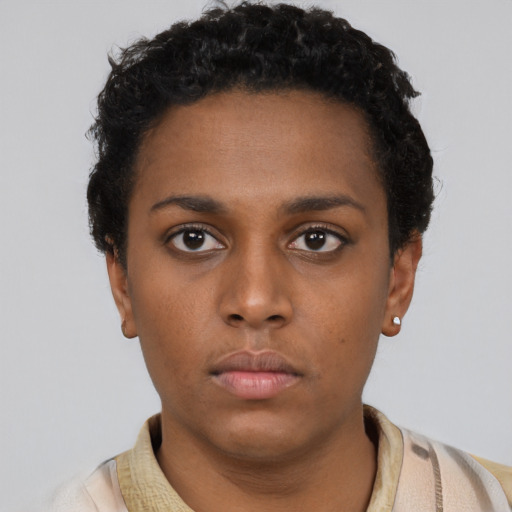 Neutral black young-adult female with short  brown hair and brown eyes