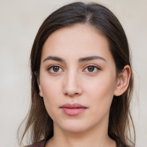 Neutral white young-adult female with medium  brown hair and grey eyes