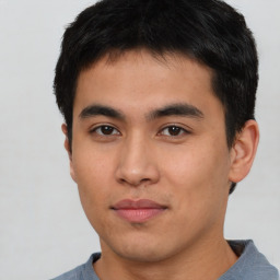 Neutral asian young-adult male with short  black hair and brown eyes