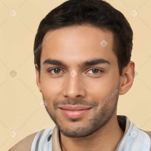 Joyful latino young-adult male with short  black hair and brown eyes