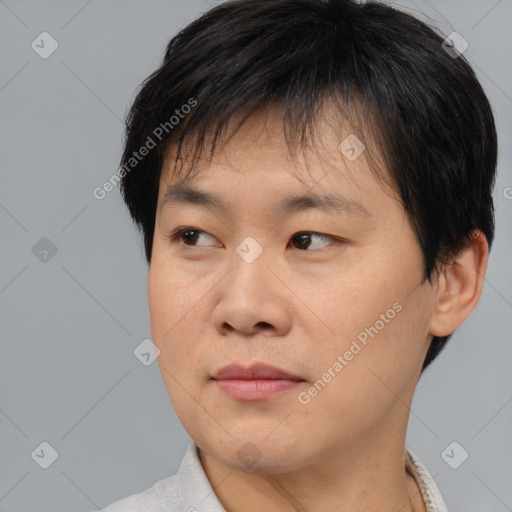 Neutral asian young-adult male with short  brown hair and brown eyes