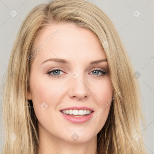 Joyful white young-adult female with long  brown hair and blue eyes