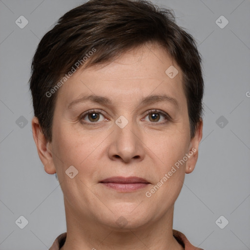 Joyful white adult female with short  brown hair and grey eyes