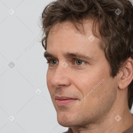 Neutral white adult male with short  brown hair and brown eyes