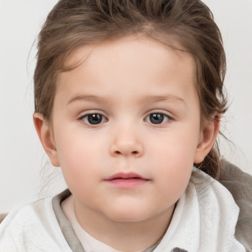 Neutral white child female with medium  brown hair and brown eyes