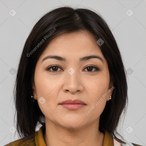 Joyful latino young-adult female with medium  brown hair and brown eyes