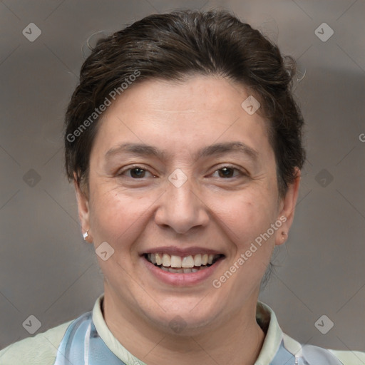 Joyful white adult female with short  brown hair and brown eyes