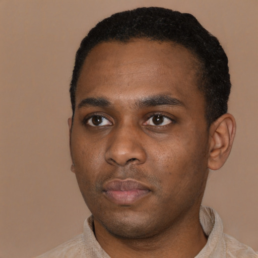 Neutral black young-adult male with short  black hair and brown eyes