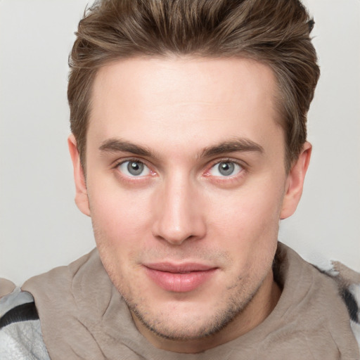 Neutral white young-adult male with short  brown hair and grey eyes