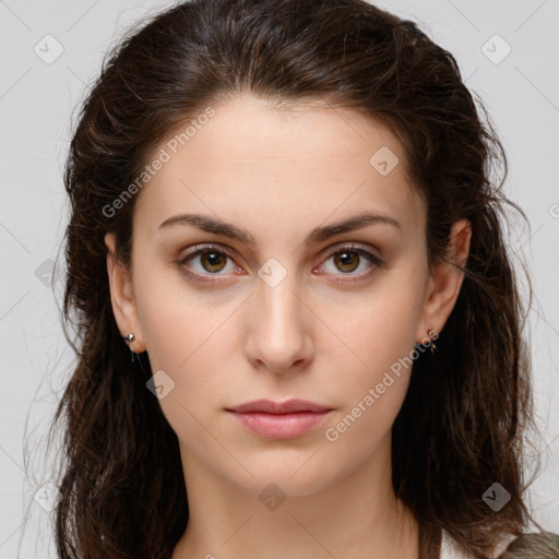 Neutral white young-adult female with long  brown hair and brown eyes