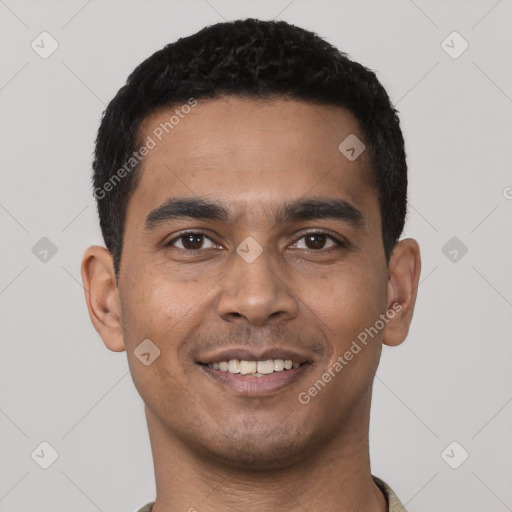 Joyful latino young-adult male with short  black hair and brown eyes