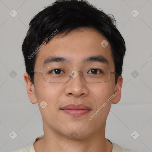 Joyful asian young-adult male with short  brown hair and brown eyes