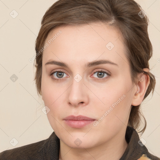 Neutral white young-adult female with medium  brown hair and grey eyes