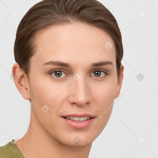 Joyful white young-adult female with short  brown hair and grey eyes