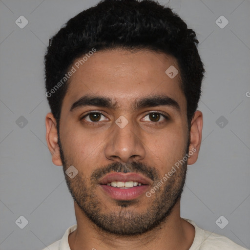 Joyful latino young-adult male with short  black hair and brown eyes