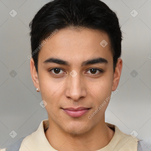 Joyful latino young-adult male with short  black hair and brown eyes