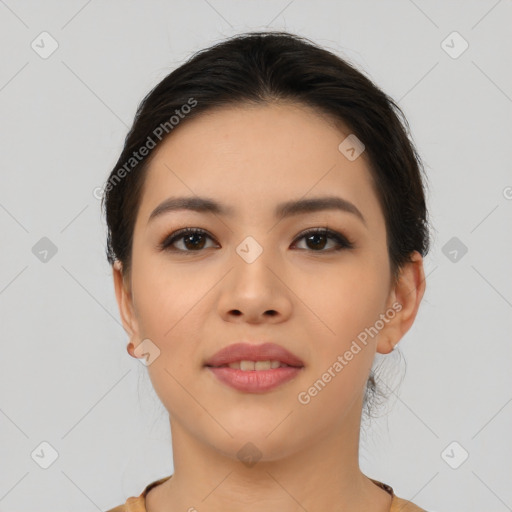 Joyful asian young-adult female with short  brown hair and brown eyes