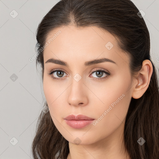 Neutral white young-adult female with long  brown hair and brown eyes