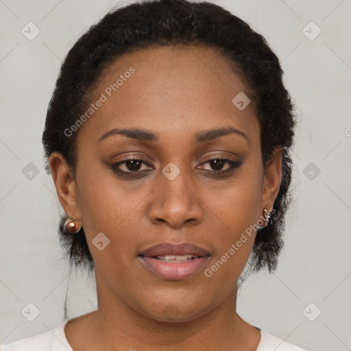 Joyful black young-adult female with short  brown hair and brown eyes