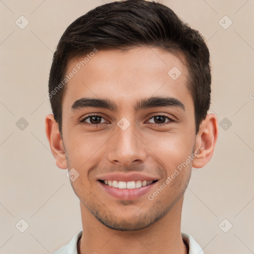 Joyful white young-adult male with short  brown hair and brown eyes