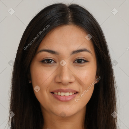 Joyful latino young-adult female with long  brown hair and brown eyes