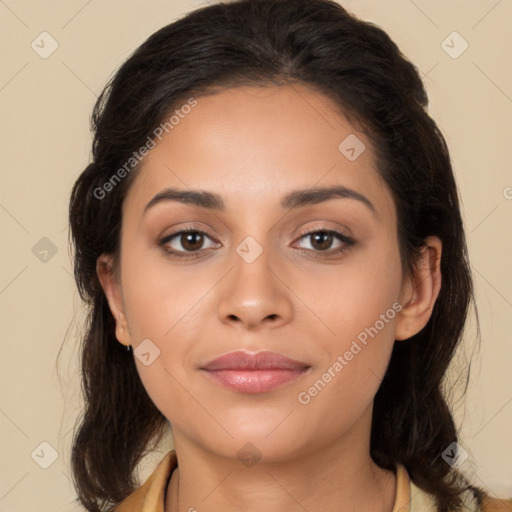 Joyful latino young-adult female with long  brown hair and brown eyes