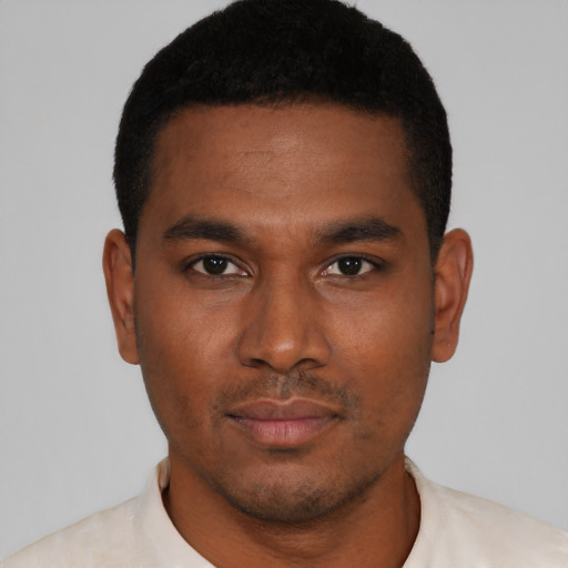 Neutral latino young-adult male with short  black hair and brown eyes