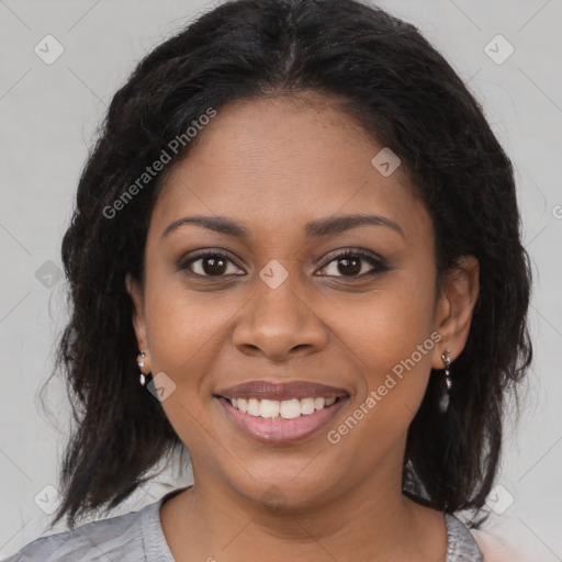 Joyful black young-adult female with medium  brown hair and brown eyes