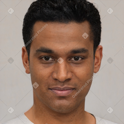 Joyful latino young-adult male with short  black hair and brown eyes