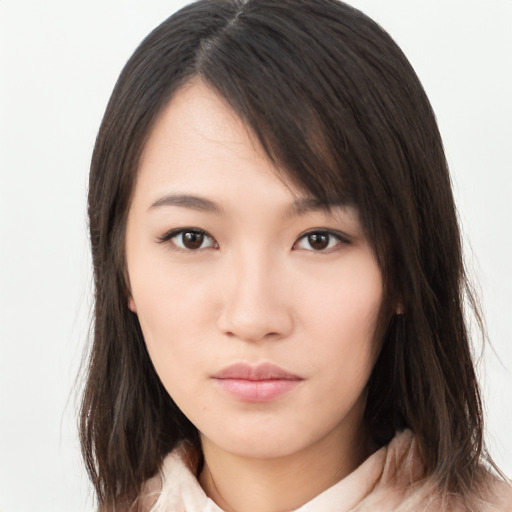 Neutral asian young-adult female with medium  brown hair and brown eyes