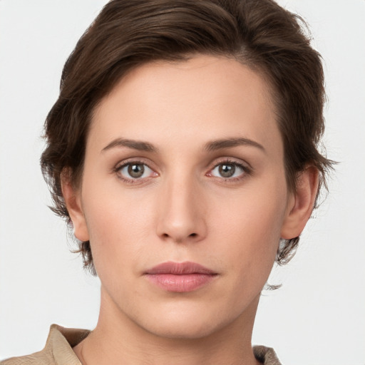 Neutral white young-adult female with medium  brown hair and grey eyes